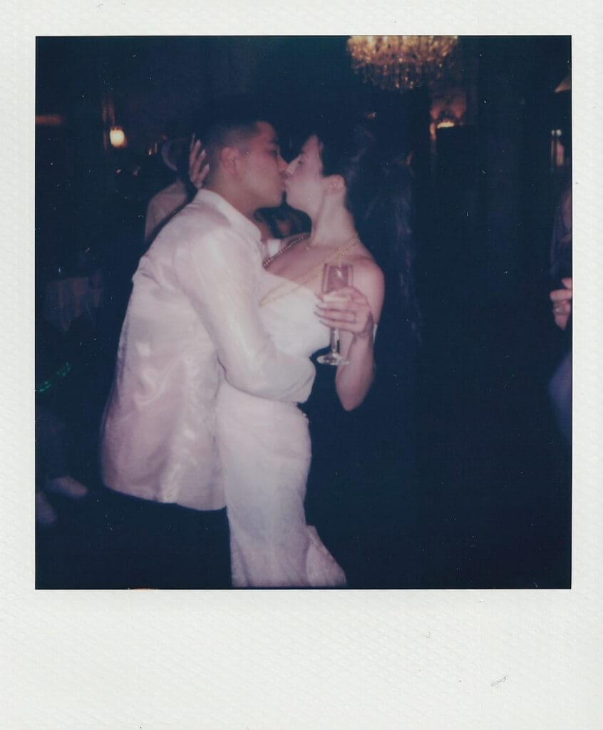 Film Polaroid of the bride and groom kissing on the dance floor at their Philadelphia wedding